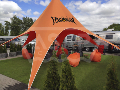 Starshades Canopy with festive decorations at an outdoor party.